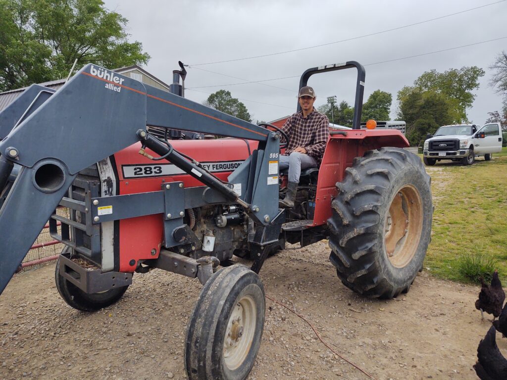 Christian on tractor